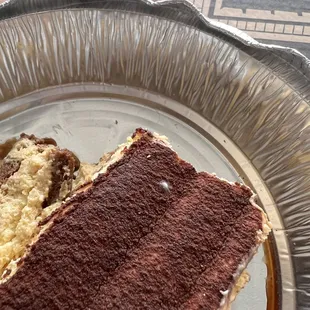 Absolutely disgusting!! tiramisu had white, fuzzy mold and look close enough the hairs in the pan above.