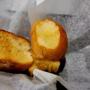 a piece of bread with a bite taken out of it