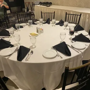 a table set for a formal dinner