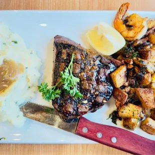 steak, potatoes, and shrimp