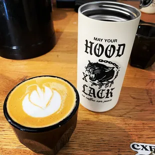 a cup of coffee and a mug of cappuccino