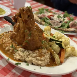 Ossobuco Special: Pork that falls off the bone served with risotto/rice and veggies