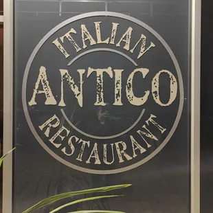 a sign for an italian restaurant