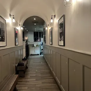 a long hallway with benches