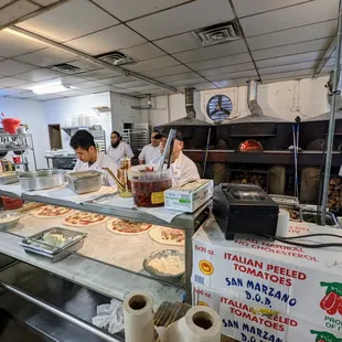 Inside. 900-degree Italian Acunto wood-burning ovens. Names: San Paolina, San Gennaro and San Felice.