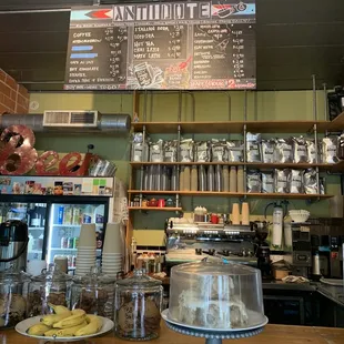 menus on the wall above the counter