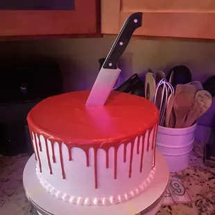 Tres Leches Cake. Two 12 inch rounds stacked on top of each other. We added the knife.