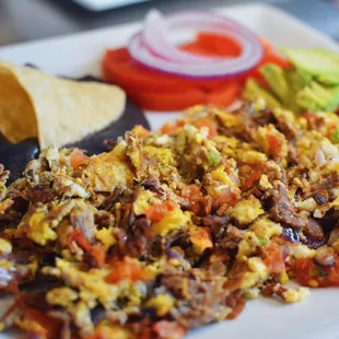 a plate of breakfast food