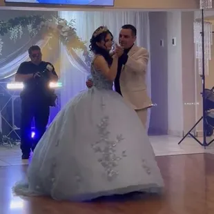 Father and daughter dance with slideshow