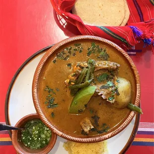 Pepián de Gallina: Guatemalan Chicken Stew w/ pumpkin seeds, sesame seeds, tomato spices, non-spicy chili peppers | $23.50