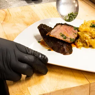 a plate of food being prepared