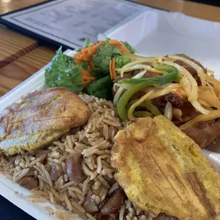 Look how big the portions are. Poule with Side. Rice and beans.