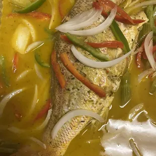 a fish with vegetables