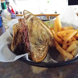 The patty melt with fries.