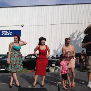 a group of people standing on a stage