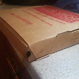 Pizza was literally bulging out of this box!  Heftiest pizza we&apos;ve ever had!!