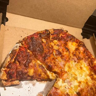 Burnt double decker. Greasy leaking horrible burnt pizza.