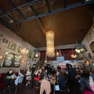 a restaurant with a chandelier