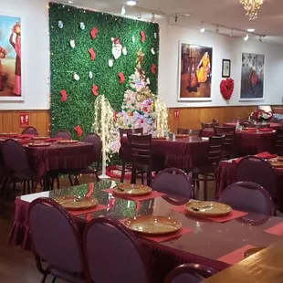 a dining room decorated for christmas