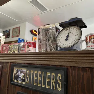 a clock on a shelf