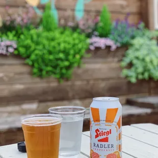 a beer and a glass on a table