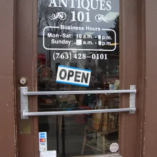 Hours of operation, front entry door.