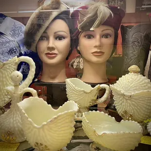 Vintage hats and milk glass