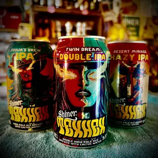 three cans of double ipa