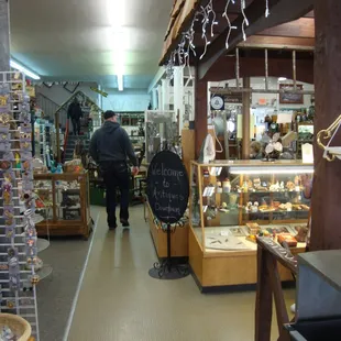 View inside the store from the front entry (checkout desk on the right).