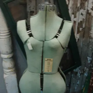 A vintage dress form.