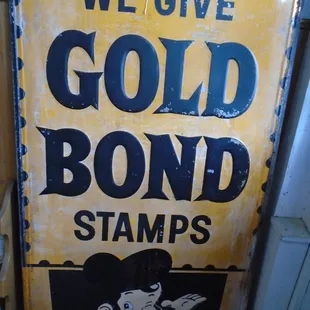 A pretty big vintage metal sign with great graphics and a nice patina.