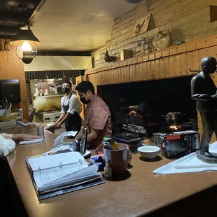 a group of people sitting around a table