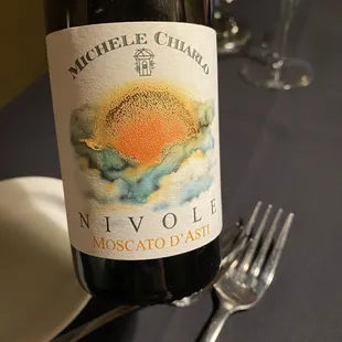 a bottle of wine on a table