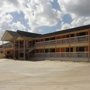 Large Parking Lot Behind Hotel