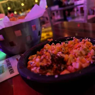 Esquites!!! Street corn, cut off the cob, mixed up extra special, and served to you for you munching pleasure.