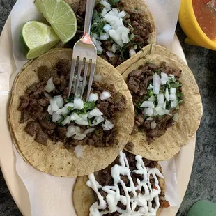 Stake tacos and one picadillo sope, the amazing home maid salsa is what was in that cute yellow dish, I had to ask for more!!