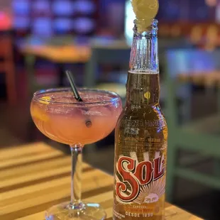 Sol beer and a butterfly corazon