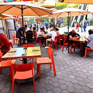 Patio seating but only one waiter staffed.