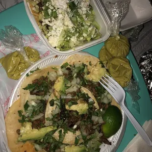 Barbacoa tostada and carne asada tacos