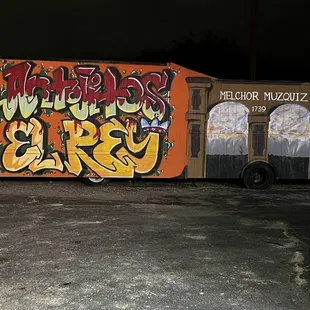 graffiti on the side of a truck