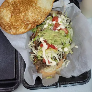 a hamburger and a toasted bread