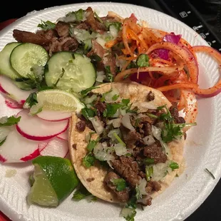 I took a bite before taking the picture. Tacos are $3 but very good meat portions. It wasn&apos;t a long wait either.   Ps. Cash only !!!