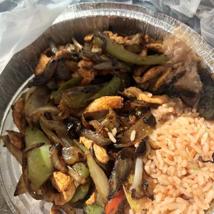 Chicken fajitas with rice and refried beans