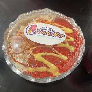 a pizza with sauce on it