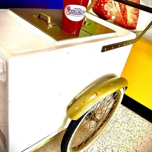 an ice cream cart on wheels