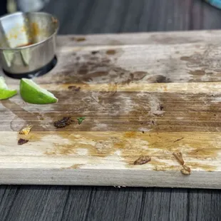 Cleaned the board where tacos were served.