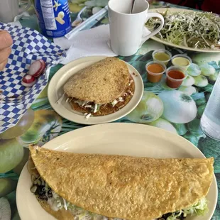 quesadilla de huitlacoche (bottom), Gordita de Chicharron Prensado Molido (top)