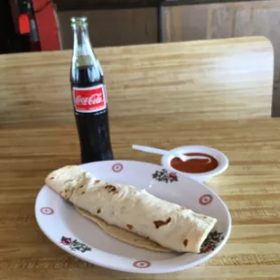 Delicious Pork &amp; Bean Burrito! Careful, the salsa has a big kick but is very tasty! Be prepared, it&apos;s Cash Only!