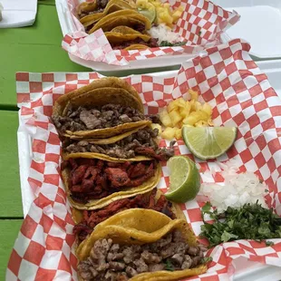 Tacos de carne asada and adobaba with piña on the side