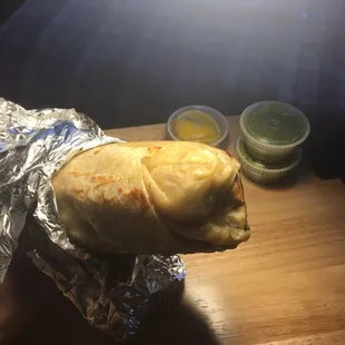 Asada burrito with dramatic lighting